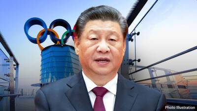 Chinese officials interrupt live Olympic TV broadcast, push reporter out of frame