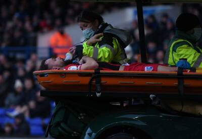 Gillingham to wait on scans after Danny Lloyd is injured in the League 1 match at Ipswich Town