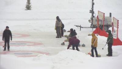 Curlers hit the frozen Red River in Winnipeg's annual outdoor bonspiel for charity
