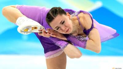 Figure skating-Valieva shines as Russians roll into team event lead