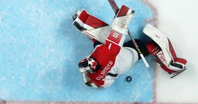 Olympics-Ice hockey-China upset rivals Japan in tense shootout