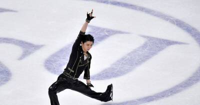 Olympics-Figure skating-Beijing's 'Most Wanted' Hanyu finally touches down