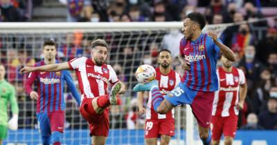 Soccer-Clinical Barcelona beat Atletico 4-2 at Camp Nou