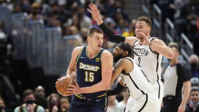 Jokic has triple-double, Nuggets hand Nets 8th loss in a row