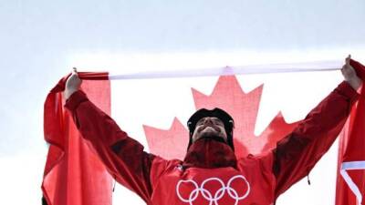 Winter Olympics: Max Parrot wins snowboard slopestyle gold three years after cancer diagnosis
