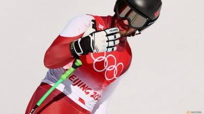 Alpine Skiing-Austria's Hemetsberger finishes downhill race despite bloody nose - channelnewsasia.com - Germany - Switzerland - China - Beijing - Austria