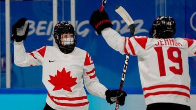 Canada, Russia women's hockey players masked for game after hourlong delay due to COVID-19 test processing