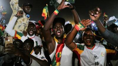 Senegal fans celebrate in the streets of Dakar after winning Afcon 2021 - in pictures