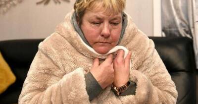 Rishi Sunak - Widow who can't afford to heat her home sits in dressing gown with a hot water bottle - manchestereveningnews.co.uk - Britain - county Day