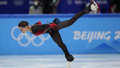 Kamila Valieva makes history at Olympics as Russians win team gold