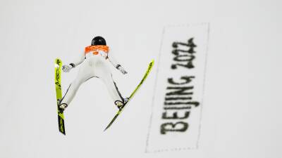 Slovenia wins Olympic debut of ski jumping mixed team event