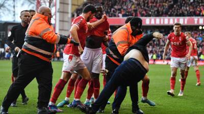 Leicester fan charged with assaulting Nottingham Forest players during FA Cup clash