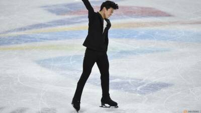 Figureskating-Chen scores world record for massive lead over shocked Hanyu