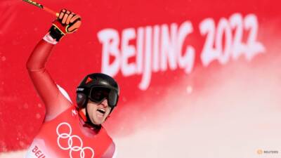Alpine skiing: Austria's Mayer claims historic gold in men's super-G