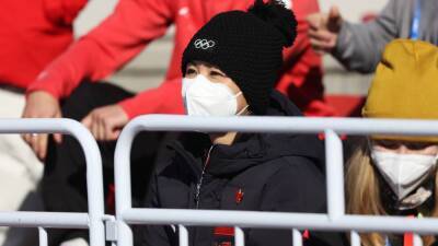 Peng Shuai watches China star Eileen Gu win gold at Winter Olympics - in pictures
