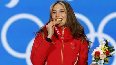 Beijing claims Gu as a daughter after golden day in China