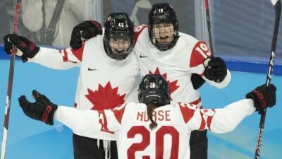 Jenner scores twice, Poulin on a penalty shot in Canada's win over U.S.