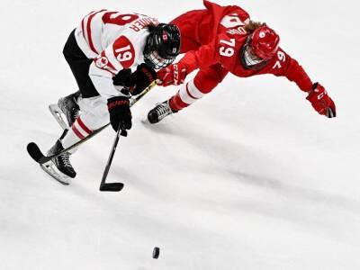 Winter Olympics: Ice Hockey Players Wear Covid Face Masks During Match