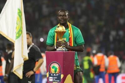 Aliou Cisse - Senegal awards $87,000 cash, land to Cup of Nations-winning squad - news24.com - Qatar - Egypt - Cameroon - Senegal -  Dakar