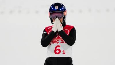 Athletes criticise International Ski Federation for disqualifying female ski jumpers for their outfits during mixed team competition at Olympics