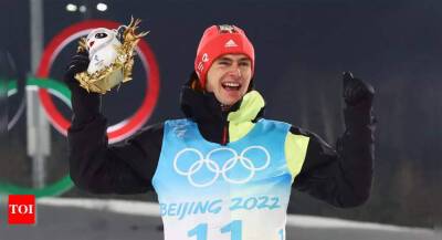 Winter Olympics: Germany's Geiger wins normal hill gold with stunning comeback - timesofindia.indiatimes.com - Germany - Norway - Beijing - Austria - Japan