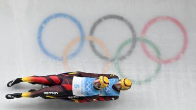 Winter Olympics 2022 - Tobias Wendl and Tobias Arlt defend gold medal in mixed luge for third consecutive title