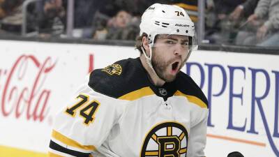 Jake DeBrusk's hat trick sends streaking Bruins past Kings
