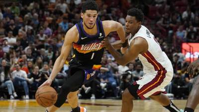 Devin Booker has 23 points in return, Suns roll past Heat