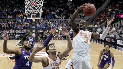 Charlie Riedel - TCU rallies from 20 down to beat No. 22 Texas, 65-60 - foxnews.com - state Texas - state Missouri - state Kansas - state West Virginia