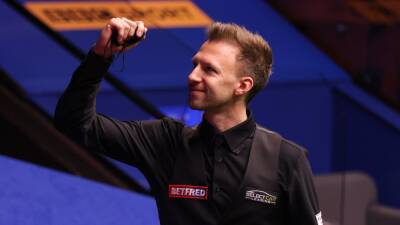 Trump battles back from 4-1 down to beat Liang Wenbo