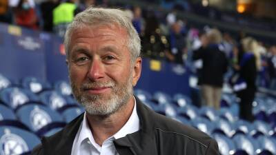 Premier League disqualifies Chelsea owner Roman Abramovich over links to Russian President Vladimir Putin