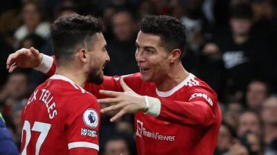 Liverpool keep up chase with City, Ronaldo hat-trick hero