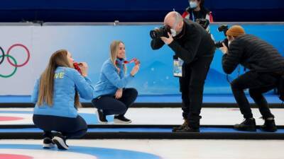 Women starred at 2022 Winter Olympics, but men photographed most of the action