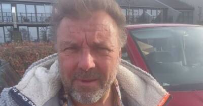 Exhausted looking Homes Under The Hammer's Martin Roberts drives 26 hours on Ukraine 'mercy dash'