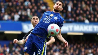 Chelsea put aside turmoil while Gunners march on