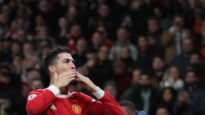 Cristiano Ronaldo nets hat-trick as Manchester United beat Tottenham in thriller