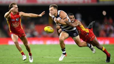 New AFL season brings new rules on holding the ball, time delays and umpire abuse