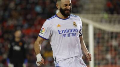 Real Madrid's Benzema breaks Henry's French record but limps off ahead of el clasico