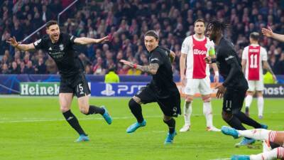 Benfica stun Ajax in Amsterdam to progress to quarter-finals