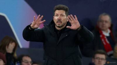 Man United facing likely UEFA action after fans hurl objects at Simeone