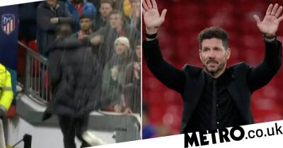 Diego Simeone responds to Manchester United fans throwing drinks at him after Atletico Madrid’s Champions League win