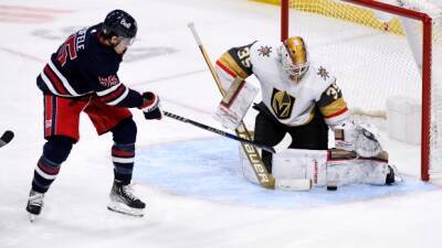 Connor extends goal-scoring streak to lead Jets over Golden Knights