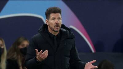 Man Utd to identify and ban fans who threw objects at Atletico coach Simeone
