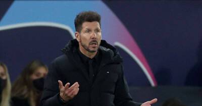 Soccer-Man Utd to identify and ban fans who threw objects at Atletico coach Simeone