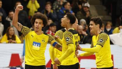 Axel Witsel - Toby Davis - Late Witsel goal earns Dortmund win at Mainz, keeps title race open - channelnewsasia.com - Germany - Belgium