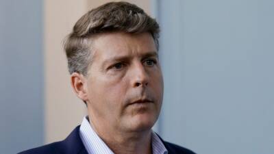 New York Yankees' Hal Steinbrenner says he's not in a spending war with the New York Mets