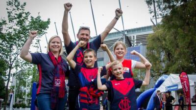 Melbourne reclaims title as home of Aussie Rules footy as crowds return to the MCG