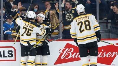 Patrice Bergeron - Connor Hellebuyck - Brad Marchand - David Pastrnak - Taylor Hall - Adam Lowry - Linus Ullmark - Hall's third period goal lifts Bruins to victory over Jets - tsn.ca -  Boston -  Chicago - county St. Louis