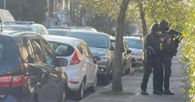 Man arrested on suspicion of attempted murder as armed police swoop on house in Chorlton