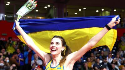Yaroslava Mahuchikh takes emotional World Athletics Indoor Championships gold medal after travelling from Ukraine